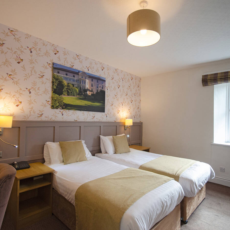 A modern Coach House room at The Royal Victoria Hotel offering stylish Llanberis accommodation with en-suite facilities.